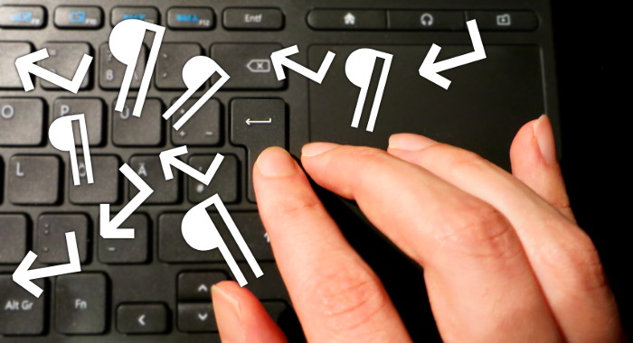 Finger über einer Return-Taste auf einer Tastatur, umgeben von im Raum schwebenden ¶- und ↵-Zeichen.